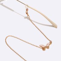 Gold-colored metal non-slip chain, with white butterfly, for glasses and masks GL1577