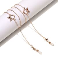Gold-colored metal non-slip chain, with owl with rhinestone, for glasses and masks GL1446