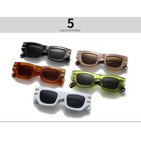 Plastic sunglasses in the shape of a 