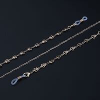 Gold-colored metal non-slip chain, with hollow crown, for glasses and masks GL882