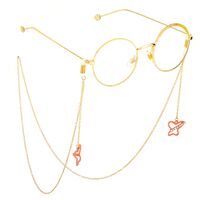 Gold-colored metal non-slip chain, with pendant pink butterfly with rhinestone, for glasses and masks GL711