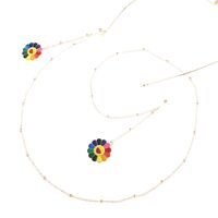 Gold-colored metal non-slip chain, with pendant sunflower and beads, for glasses and masks GL812