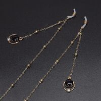 Gold-colored metal non-slip chain, with pendant black pearl and rhinestones, for glasses and masks GL579