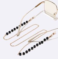Gold-colored metal non-slip chain, with square black crystal, for glasses and masks GL1480