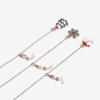 Set of two gold and silver glasses chain with hollow moons and stars GM082