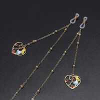 Gold-colored metal non-slip chain, with pendant heart with beads, for glasses and masks GL578