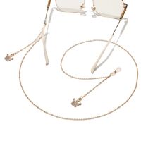 Gold-colored metal non-slip chain, with crown pendant with rhinestones, for glasses and masks GL1510