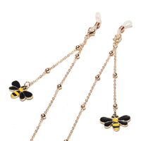 Gold-colored metal non-slip chain, with pendant bee and beads, for glasses and masks GL1508