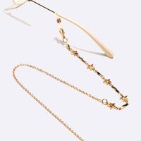 Gold-colored metal non-slip chain, with hollow star, for glasses and masks GL1583