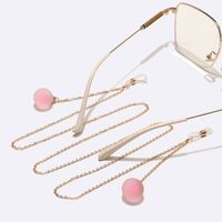 Gold-colored metal non-slip chain, with a matte pink ball pendant, for glasses and masks GL1483