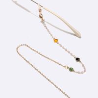 Gold-colored metal non-slip chain, with colored crystal and pearl, for glasses and masks GL1548