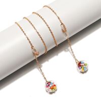 Gold-colored metal non-slip chain, with ball-shaped pendant, for glasses and masks GL1507