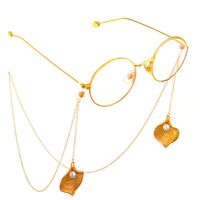 Gold-colored metal non-slip chain, with pendant geometric curved and pearl, for glasses and masks GL571