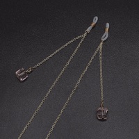 Gold-colored metal non-slip chain, with pendant pink crystal, for glasses and masks GL563