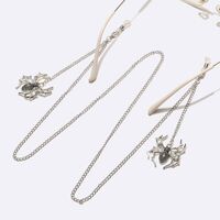 Silver-colored metal non-slip chain, with a large spider pendant, for glasses and masks GL1725