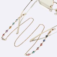 Gold-colored metal non-slip chain, with colored glasses eyes, for glasses and masks GL1703