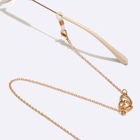 Gold-colored metal non-slip chain, with heart and rhinestones, for glasses and masks GL1575
