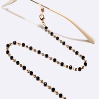 Gold-colored metal non-slip chain, with black crystal, for glasses and masks GL1588