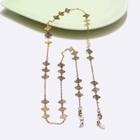 Metal glasses chain with white small daisies and discs GL1358