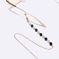 Gold-colored metal non-slip chain, with black and white pearl, for glasses and masks GL1549
