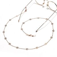 Gold-colored metal non-slip chain, with hollow rose, for glasses and masks GL1442