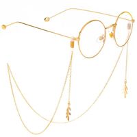 Gold-colored metal non-slip chain, with leaf-shaped pendant, for glasses and masks GL302