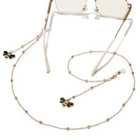 Gold-colored metal non-slip chain, with pendant bee and beads, for glasses and masks GL1508