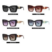 Plastic sunglasses in the shape of a 