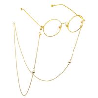 Gold-colored metal non-slip chain, with pearls and rhinestones, for glasses and masks GL624