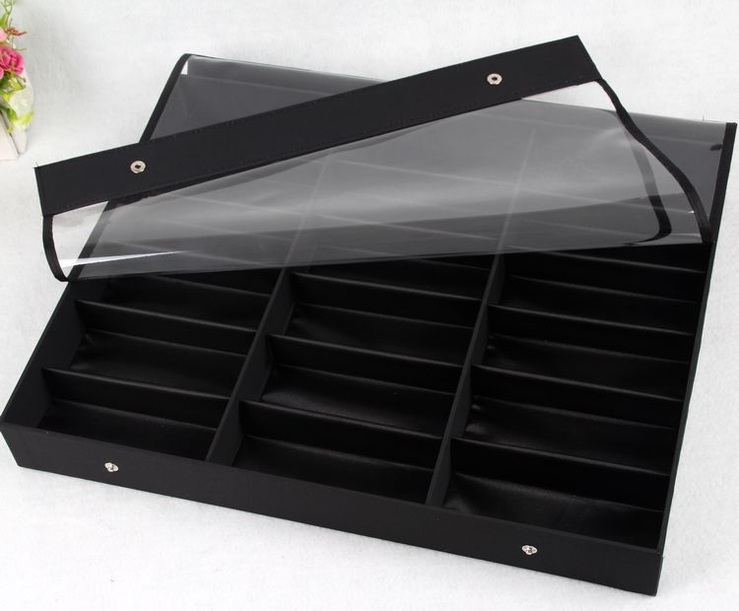 Sunglasses holder display with 18 slots, black with a black lining