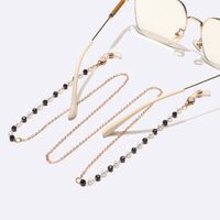 Gold-colored metal non-slip chain, with black and white crystal, for glasses and masks GL1596