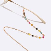 Gold-colored metal non-slip chain, with colored cristal, for glasses and masks GL1579