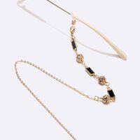 Gold-colored metal non-slip chain, with black squares and rhinestone beads, for glasses and sweater GL1527