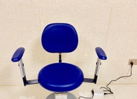 Surgical stool, operating chair rotating on wheels with lift for the ophthalmologist's office DTL16 with armrests 