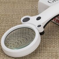 Magnifier with universal backlight, magnifying glass with handle 600600BH-XX, diameter 75 mm, magnification: 2,5X, 25X, 55X