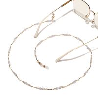 Gold-colored metal non-slip chain, with white pearl and curved stick, for glasses and masks GL1544