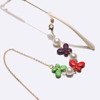 Gold-colored metal non-slip chain, with pearl and butterfly of natural stone, for glasses and masks GL1744