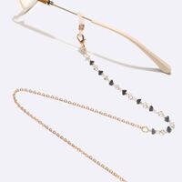 Gold-colored metal non-slip chain, with black and white crystal, for glasses and masks GL1595