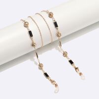 Gold-colored metal non-slip chain, with black squares and rhinestone beads, for glasses and sweater GL1527