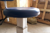 Surgical stool, operating chair rotating on wheels with lift for the ophthalmologist's office DTL16 with armrests 