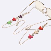 Gold-colored metal non-slip chain, with pearl and butterfly of natural stone, for glasses and masks GL1744