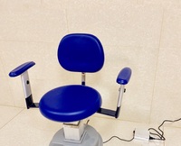Surgical stool, operating chair rotating on wheels with lift for the ophthalmologist's office DTL16 with armrests 