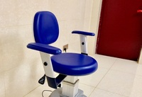 Surgical stool, operating chair rotating on wheels with lift for the ophthalmologist's office DTL16 with armrests 