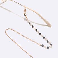 Gold-colored metal non-slip chain, with black and white crystal, for glasses and masks GL1596