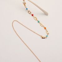 Gold-colored metal non-slip chain, with colored crystal and metal restangular, for glasses and masks GL1859